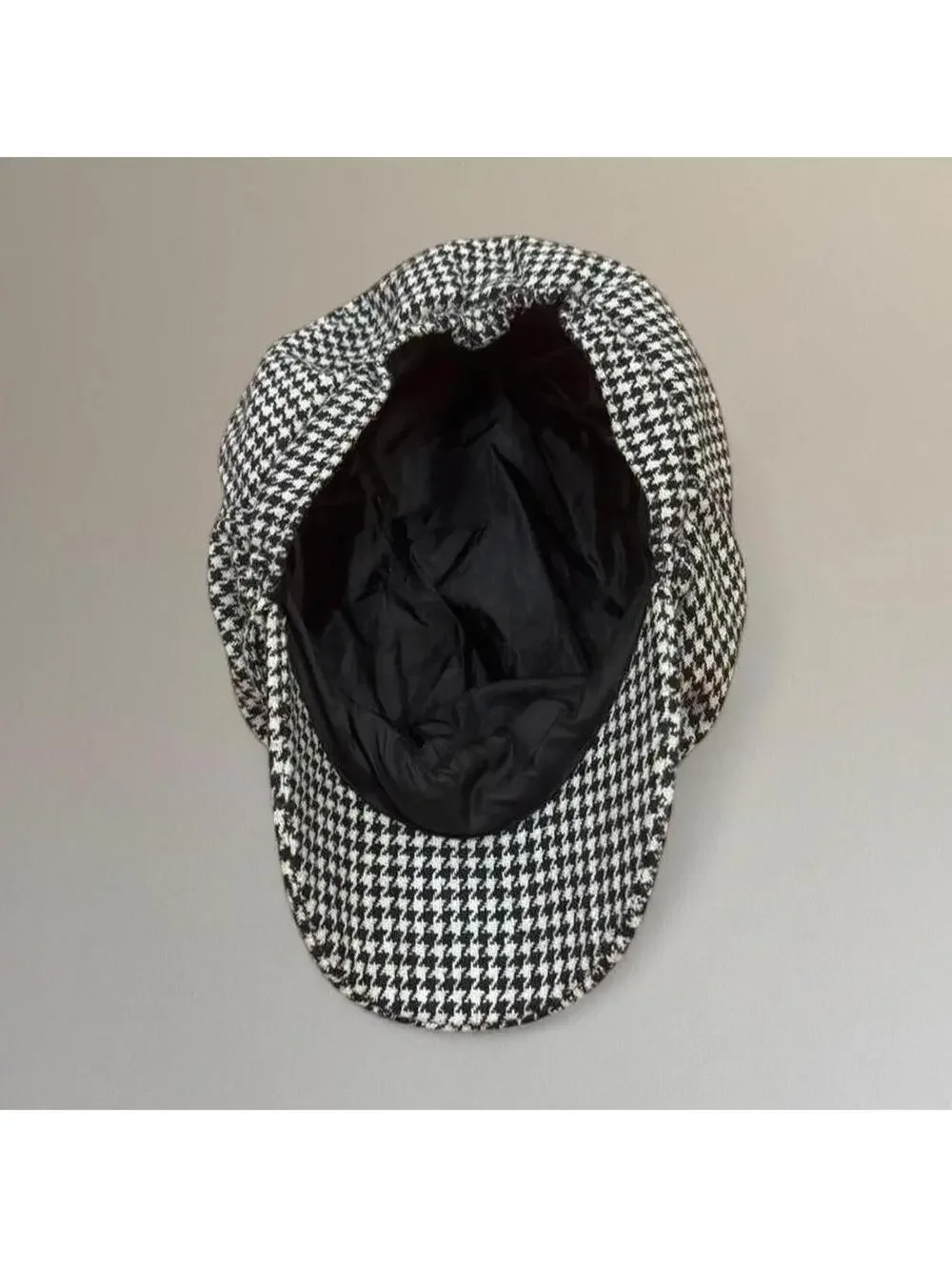 Houndstooth newsboy cap.